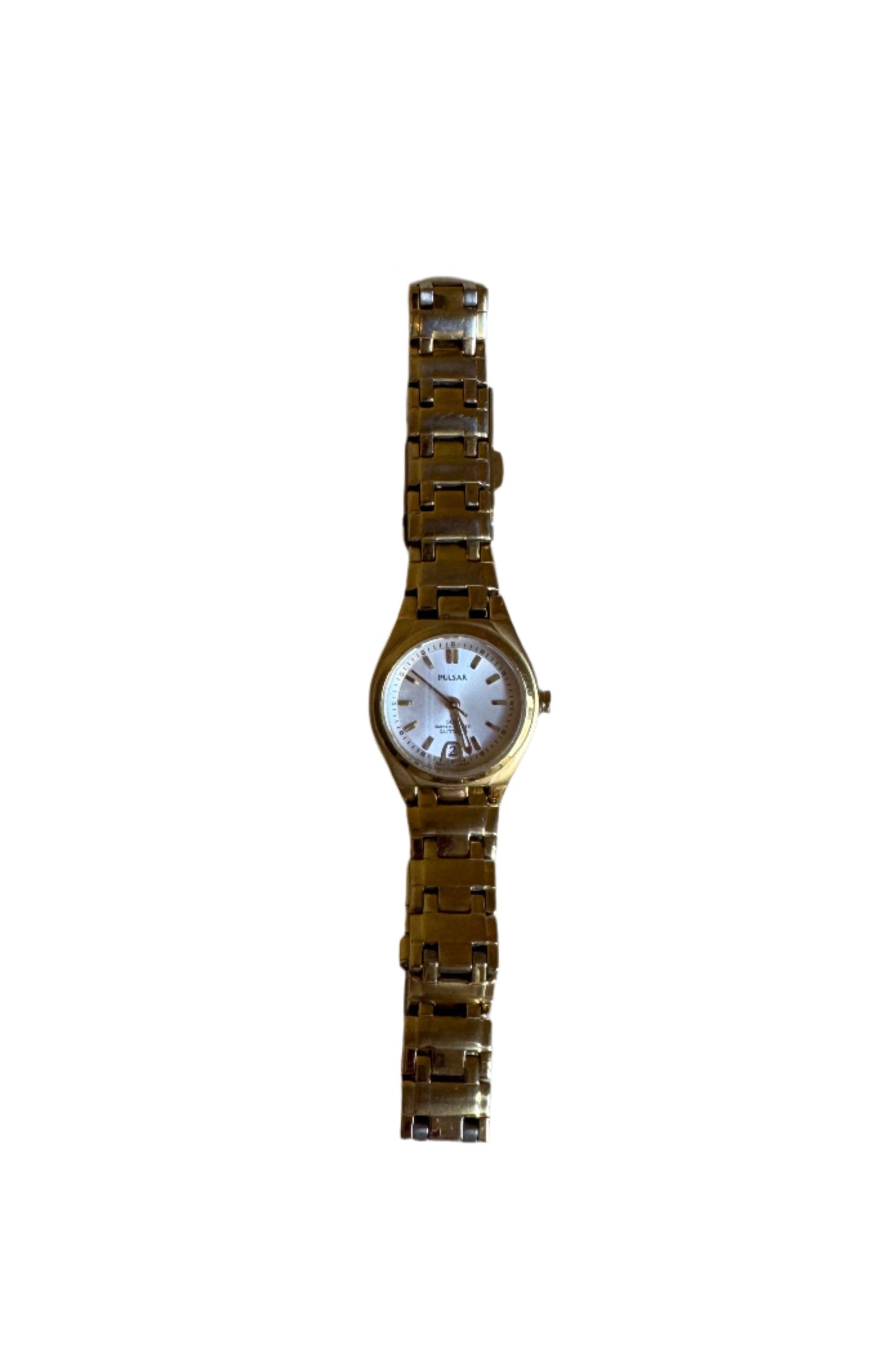 Gold Pulsar watch on a textured gray surface