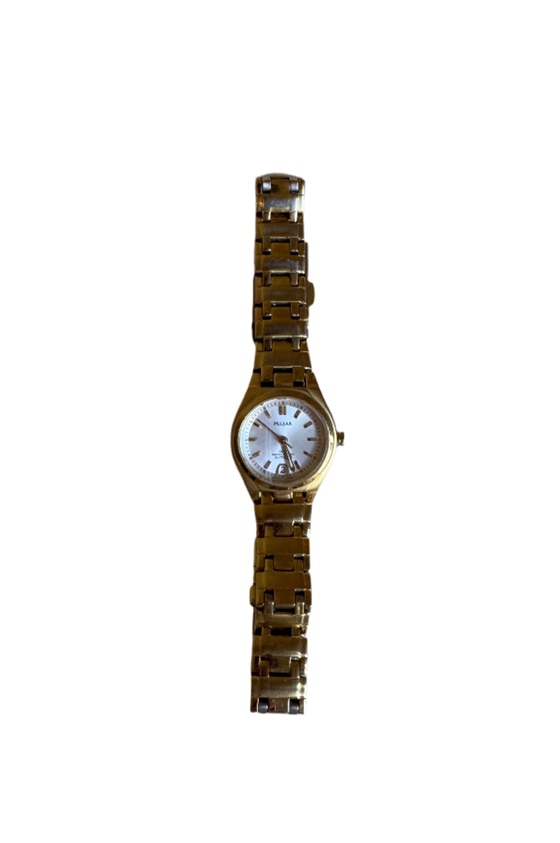 Gold Pulsar watch on a textured gray surface